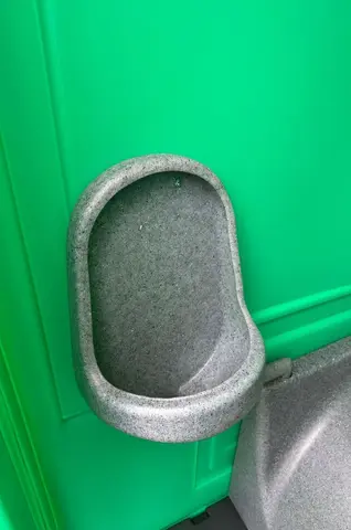 Interieur van een MTM Licht groen mobiel toilet